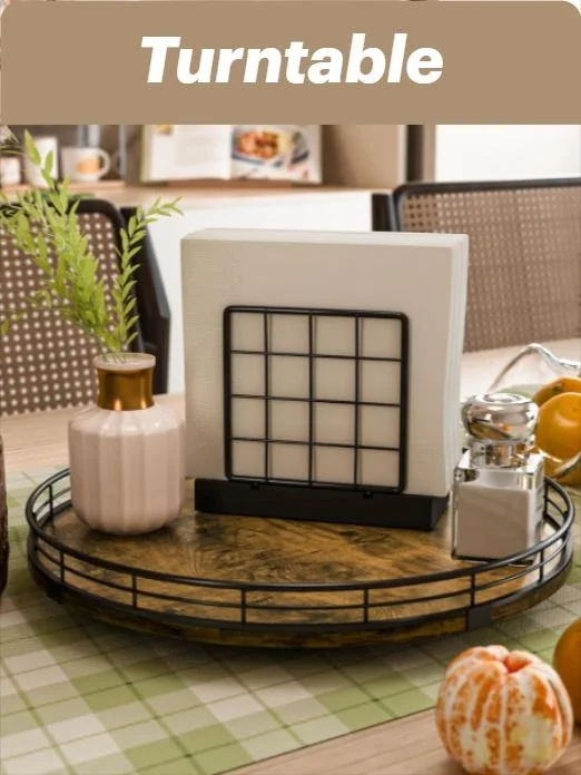 rotating lazy susan turntable kitchen organizer A round, rustic wooden lazy Susan turntable with a black metal rim sitting on a dining table, holding a napkin holder, a salt shaker, and a small decorative vase.